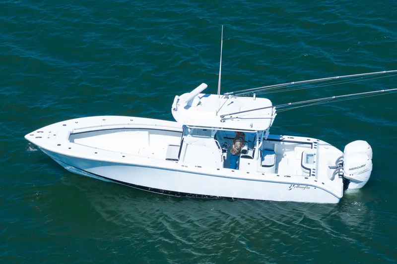 Slide: The Image of 2018 Yellowfin 32 Offshore boat on open water, viewed from above. - 16