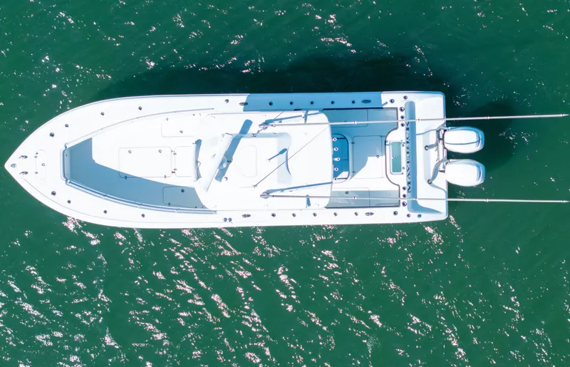 Slide: The Image of Aerial view of 2018 Yellowfin 32 Offshore boat on green water. - 19