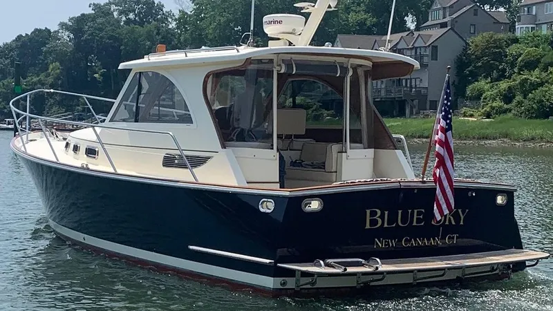 Slide: The Image of 2009 Legacy 32 boat named "Blue Sky" on water, New Canaan, CT. - 1