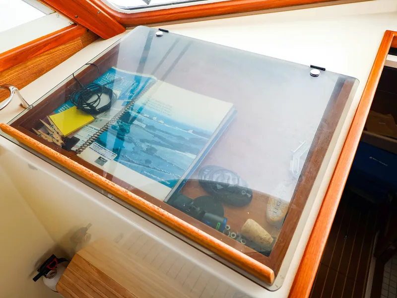 Slide: The Image of Navigational tools and charts on a Legacy 32 boat, 2009 model. - 20