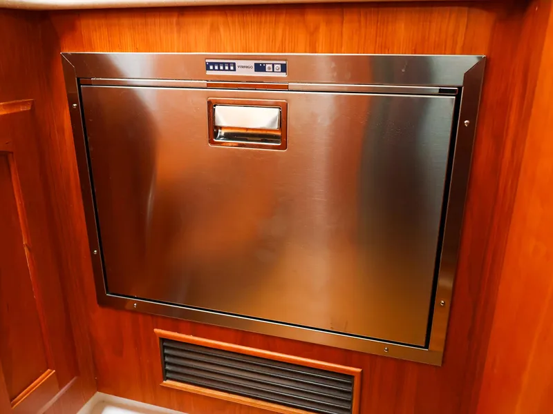 Slide: The Image of Stainless steel appliance in wooden cabinetry, Legacy 32 model, 2009. - 28