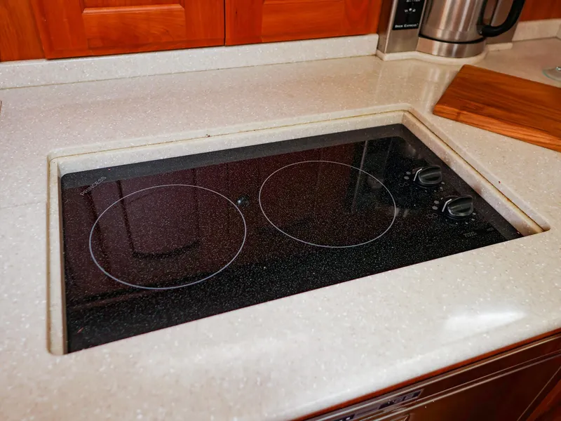 Slide: The Image of Built-in electric cooktop with two burners on a Legacy 32, 2009 model kitchen counter. - 45