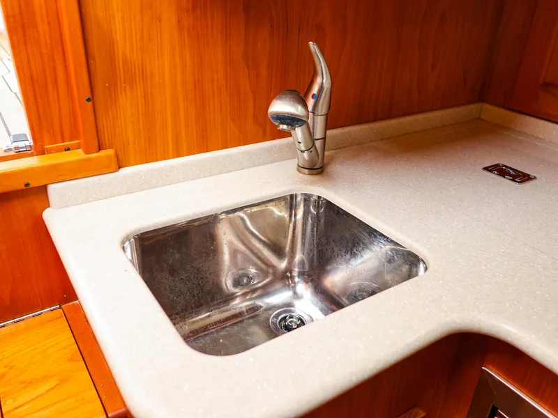 Slide: The Image of Stainless steel sink with modern faucet in 2009 Legacy 32 boat kitchen. - 46
