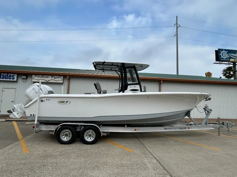The Image of 2025 Sea Hunt Gamefish 27 with Coffin Box on trailer, parked outdoors. - 0