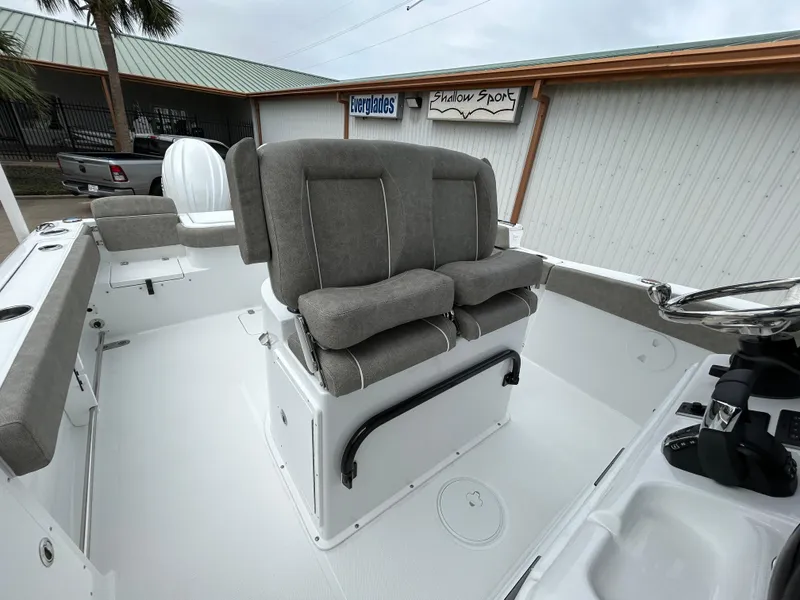 Slide: The Image of 2025 Sea Hunt Gamefish 27 boat interior with gray seating and coffin box. - 17
