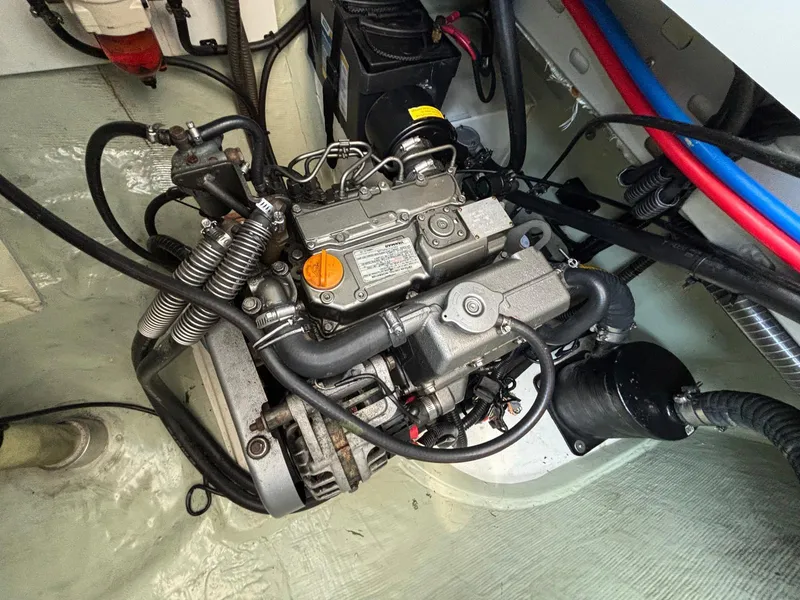 Slide: The Image of Engine compartment of a 2019 Leopard 40 catamaran, showcasing detailed mechanical components. - 29