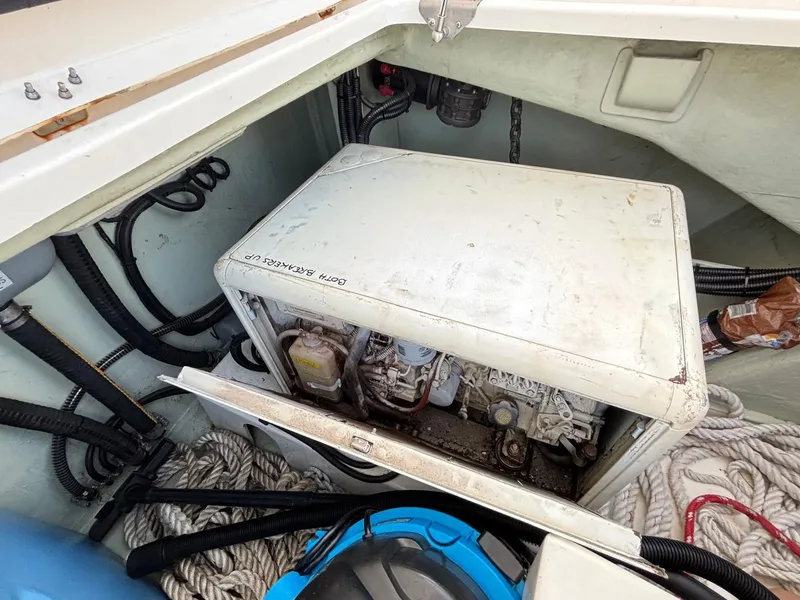 Slide: The Image of Engine compartment of a 2019 Leopard 40 catamaran with ropes and equipment. - 32