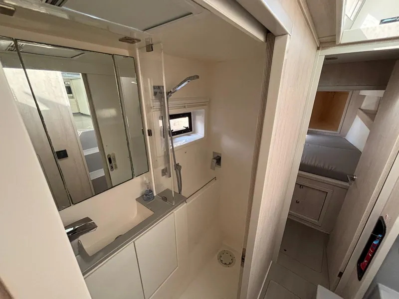 Slide: The Image of Modern bathroom interior on a 2019 Leopard 40 yacht, featuring sleek fixtures and a compact design. - 6