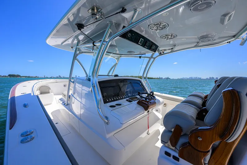 Slide: The Image of 2023 Valhalla Boatworks V-41, sleek design, luxury seating, open water view. - 10