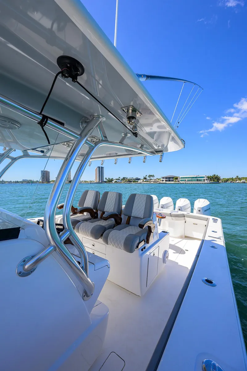 Slide: The Image of 2023 Valhalla Boatworks V-41 on water, showcasing seating and sleek design. - 16