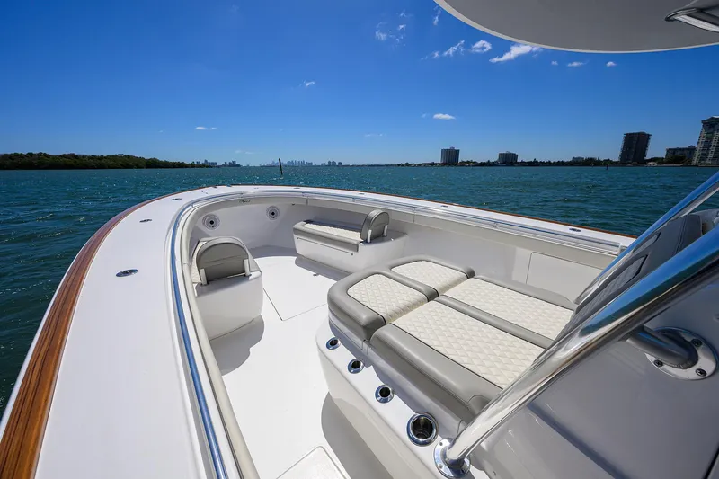 Slide: The Image of 2023 Valhalla Boatworks V-41 on water, featuring spacious seating and sleek design. - 20