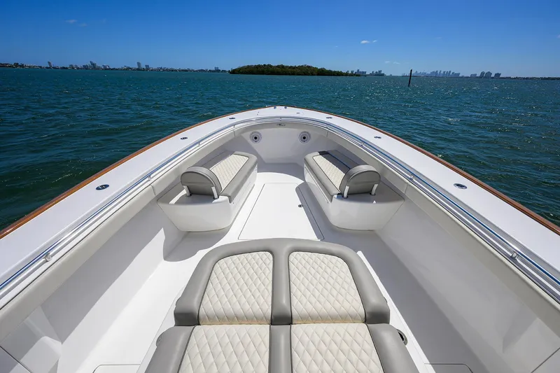 Slide: The Image of 2023 Valhalla Boatworks V-41 on water, featuring spacious seating and sleek design. - 21