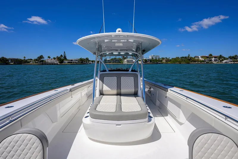 Slide: The Image of 2023 Valhalla Boatworks V-41 on water, featuring spacious seating and sleek design. - 25