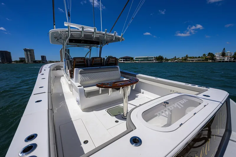 Slide: The Image of 2023 Valhalla Boatworks V-41 on water, showcasing spacious deck and seating. - 28