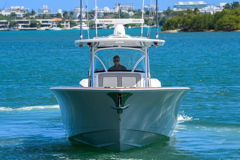 Slide: The Image of 2023 Valhalla Boatworks V-41 cruising on clear blue water. - 3