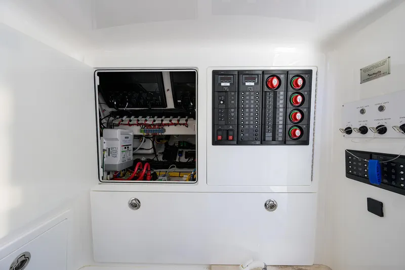 Slide: The Image of Electrical panel of 2023 Valhalla Boatworks V-41, showcasing wiring and control systems. - 37
