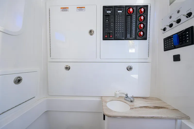 Slide: The Image of 2023 Valhalla V-41 boat interior with control panel and sink. - 38