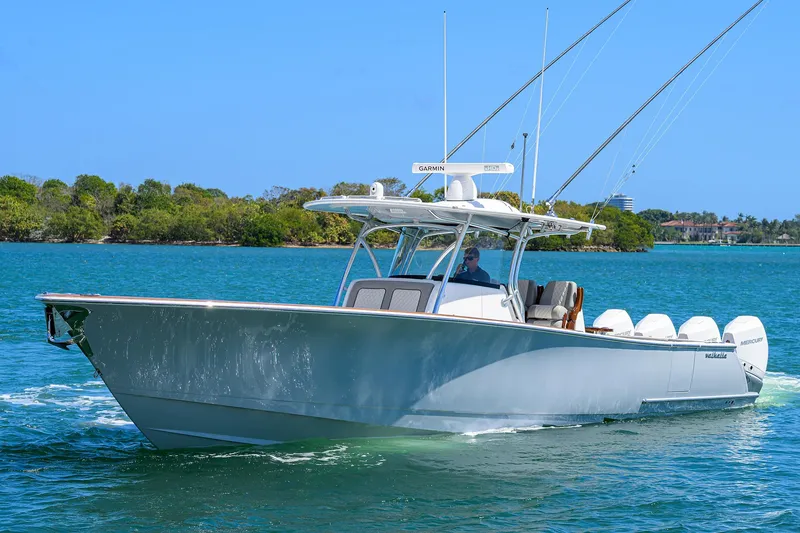 Slide: The Image of 2023 Valhalla Boatworks V-41 cruising on clear blue water. - 4