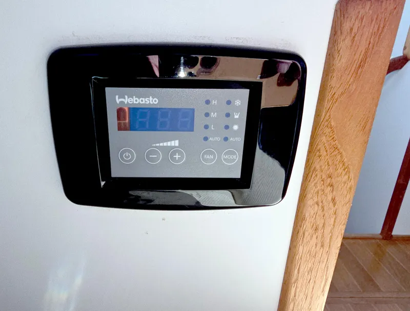 Slide: The Image of Webasto control panel on 2008 Eastern Casco Bay 31 boat interior. - 25