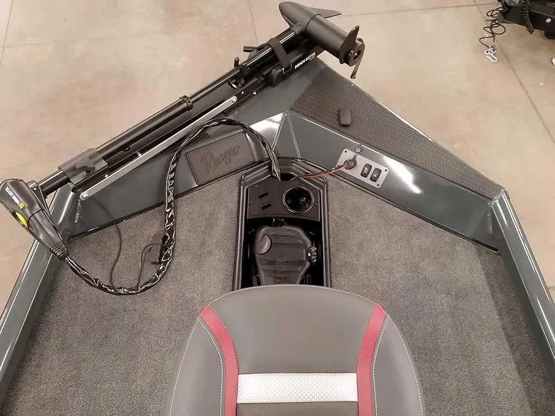 Slide: The Image of 2025 Ranger RT178 SC boat interior with trolling motor and seating. - 17
