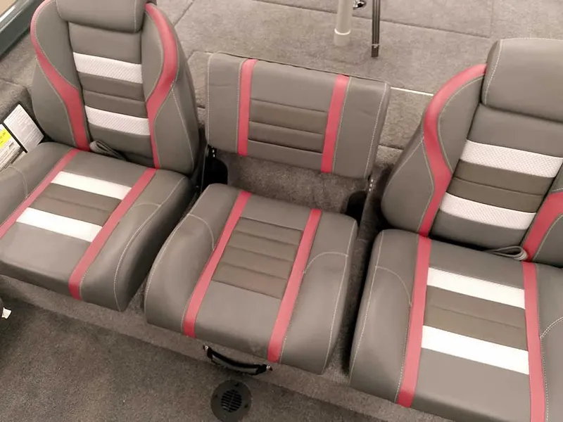 Slide: The Image of 2025 Ranger RT178 SC boat seats with gray, red, and white upholstery. - 20