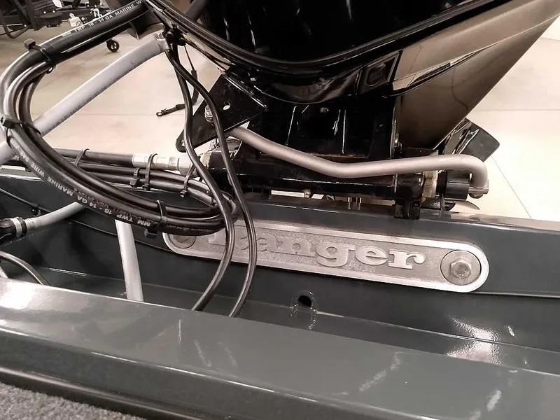 Slide: The Image of 2025 Ranger RT178 SC boat engine detail with visible wiring and branding. - 32