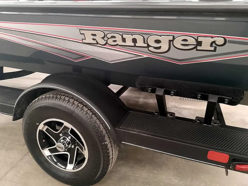 Slide: The Image of 2025 Ranger RT178 SC boat trailer with logo and wheel detail. - 7