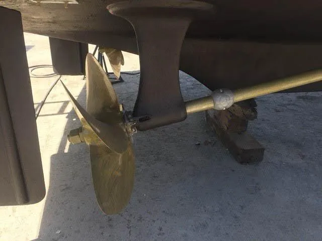 Slide: The Image of Propeller and shaft of a 1994 Shaw 57 boat on dry dock. - 22