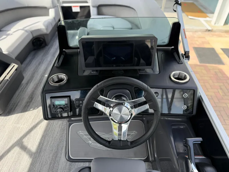 Slide: The Image of Helm of 2025 Bennington 22 MFB boat with modern steering and controls. - 10