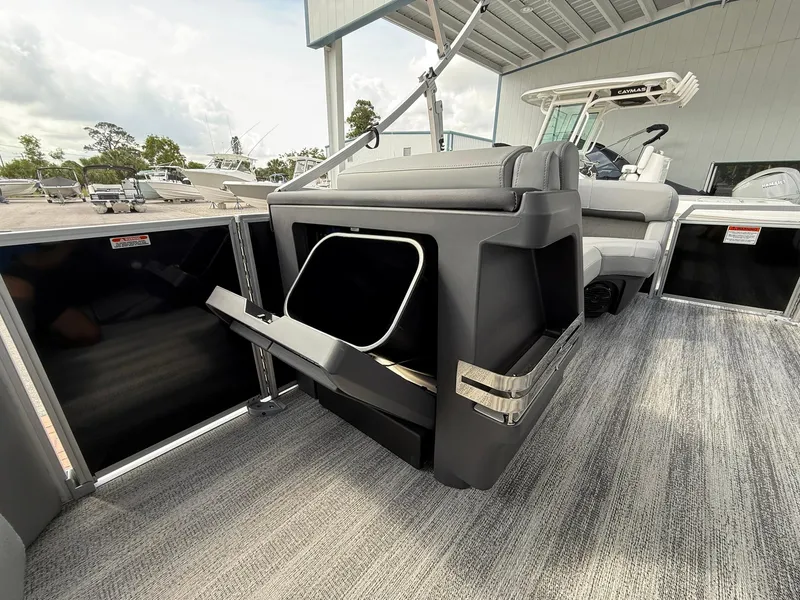 Slide: The Image of 2025 Bennington 22 MFB boat interior with seating and storage compartments. - 14