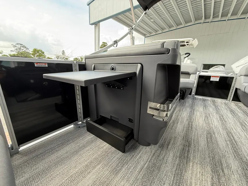 Slide: The Image of 2025 Bennington 22 MFB boat interior with modern seating and sleek design. - 15
