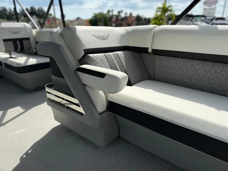 Slide: The Image of 2025 Bennington 26 MSB boat interior with luxurious seating and elegant design. - 20