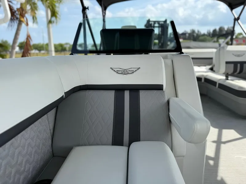 Slide: The Image of 2025 Bennington 26 MSB boat interior with luxurious seating and elegant design. - 21
