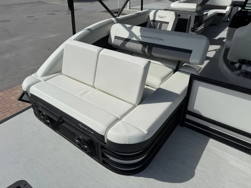Slide: The Image of 2025 Bennington 26 MSB boat with white seating and sleek design. - 6