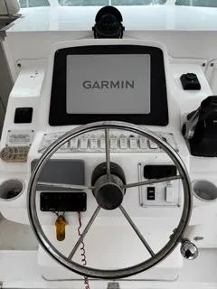 Slide: The Image of Helm of 2004 Baha Cruisers 290 King Kat with Garmin navigation system. - 22