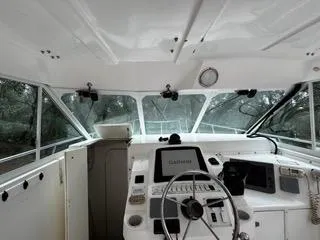 Slide: The Image of 2004 Baha Cruisers 290 King Kat boat cockpit with Garmin navigation system. - 29