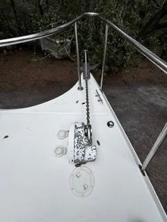 Slide: The Image of 2004 Baha Cruisers 290 King Kat boat deck with anchor chain and railing. - 41
