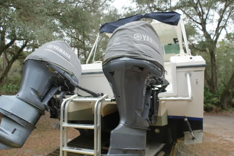 Slide: The Image of 2004 Baha Cruisers 290 King Kat with Yamaha outboard motors, rear view. - 6
