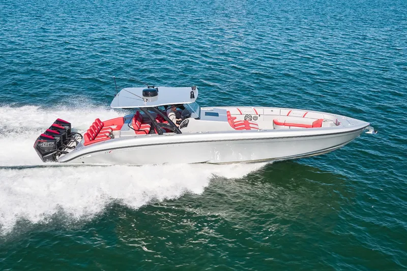 The Image of 2017 Midnight Express 43' Open boat cruising on blue ocean waters. - 0