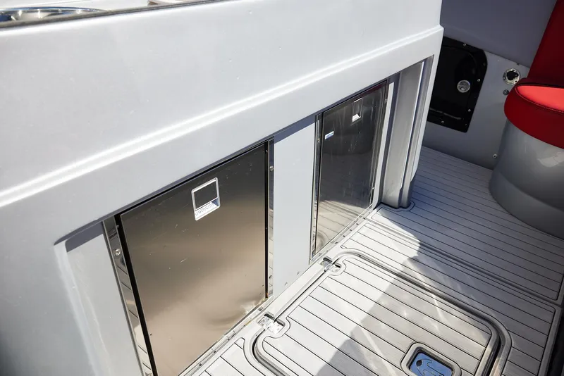 Slide: The Image of 2017 Midnight Express 43' Open boat interior with stainless steel storage compartments. - 15