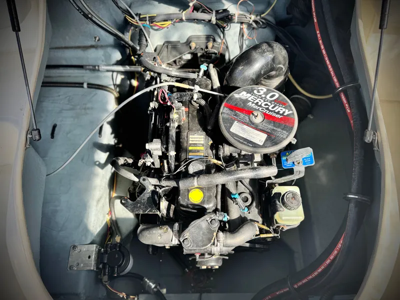 Slide: The Image of Engine of 2007 Bayliner 192 Cuddy Discovery boat, featuring a 3.0L Mercury motor. - 15