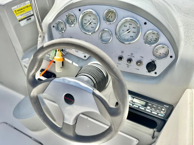 Slide: The Image of Steering wheel and dashboard of 2007 Bayliner 192 Cuddy Discovery boat. - 21