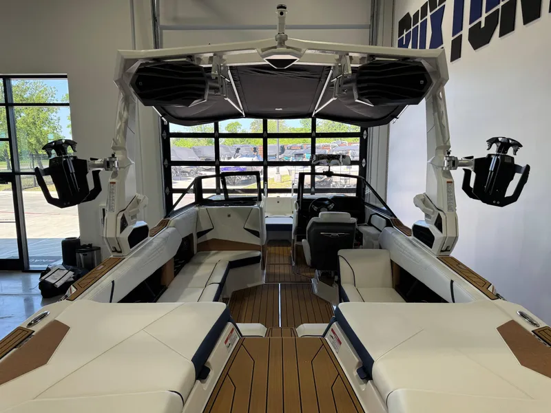 Slide: The Image of 2025 Nautique Super Air Nautique S23 interior with sleek seating and modern design. - 8