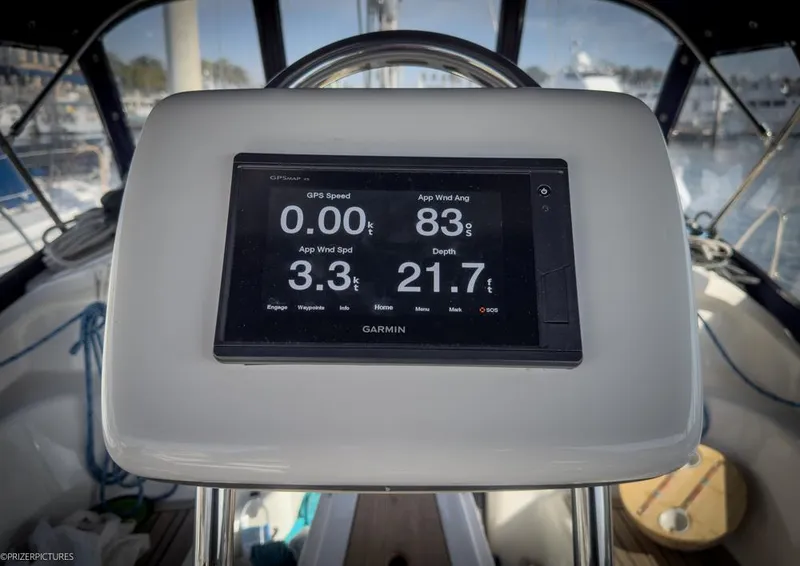 Slide: The Image of Garmin display on 2011 Elan Impression 384 yacht showing speed, wind, and depth data. - 11