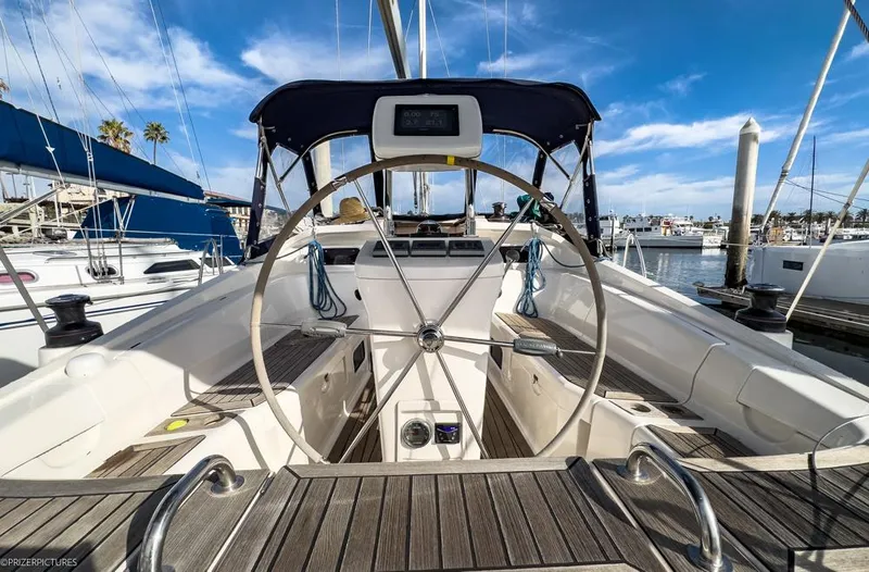 Slide: The Image of Cockpit view of 2011 Elan Impression 384 sailboat docked at marina. - 3