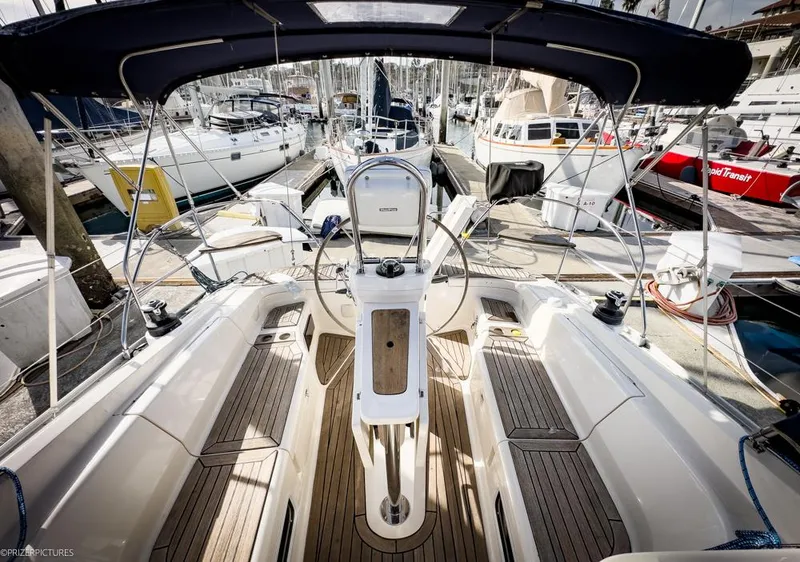 Slide: The Image of Cockpit view of 2011 Elan Impression 384 yacht docked at marina. - 34