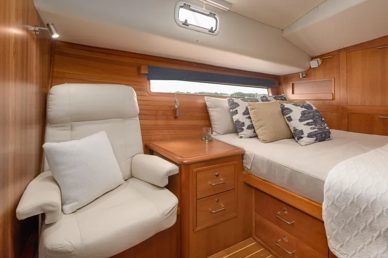 Slide: The Image of Luxurious cabin interior of 2020 MJM 53z yacht with bed and seating area. - 5