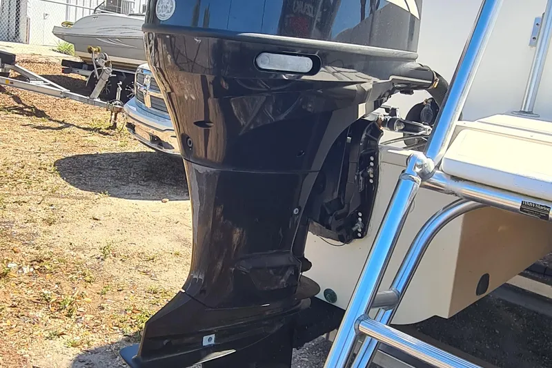 Slide: The Image of 2009 World Cat 250 DC boat engine and ladder detail. - 24