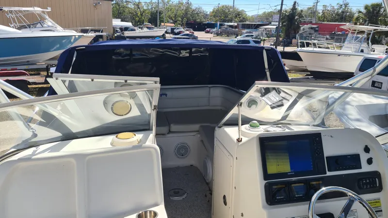 Slide: The Image of 2009 World Cat 250 DC boat interior with dual consoles and navigation equipment. - 7