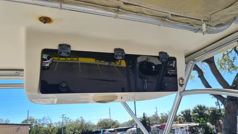Slide: The Image of 2009 World Cat 250 DC boat console with mounted electronics under canopy. - 8